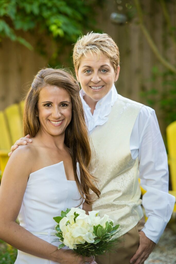 Happy wedding couple on backyard