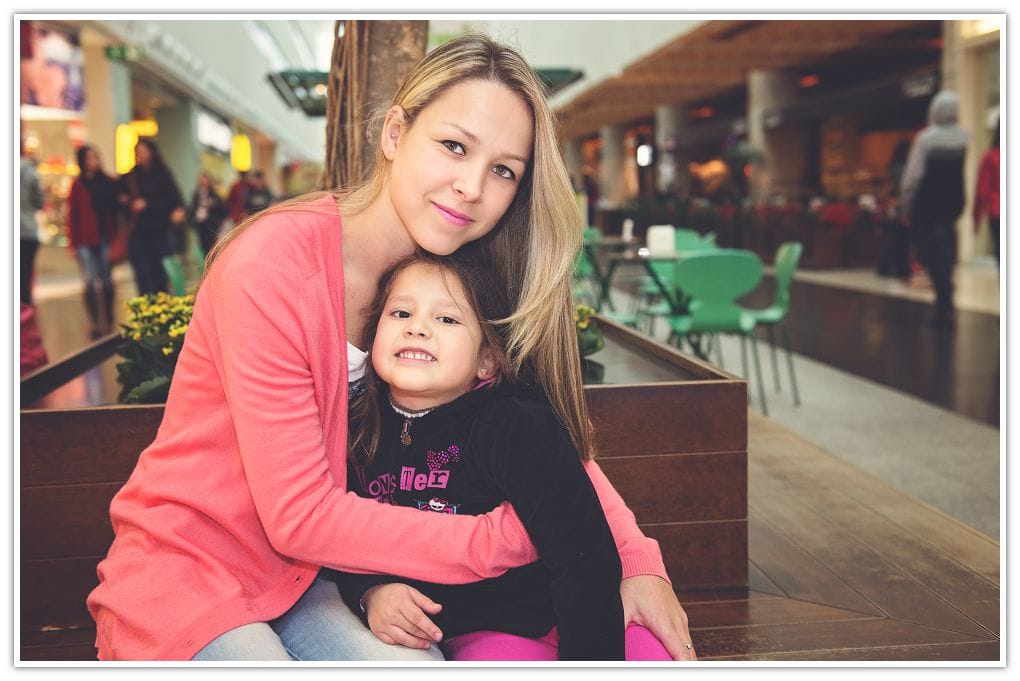 Mother and daughter laughing