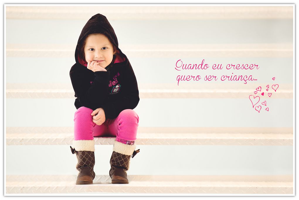 girl with pink pants seating on white stairs