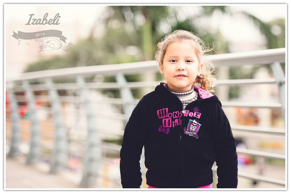 girl outside posing for pictures