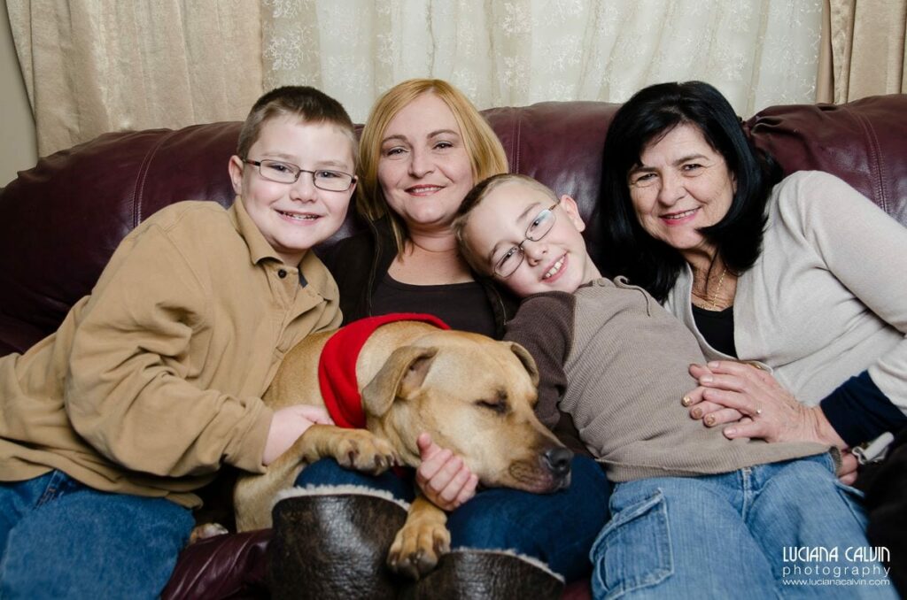 Family posing for family picture on Christmas time