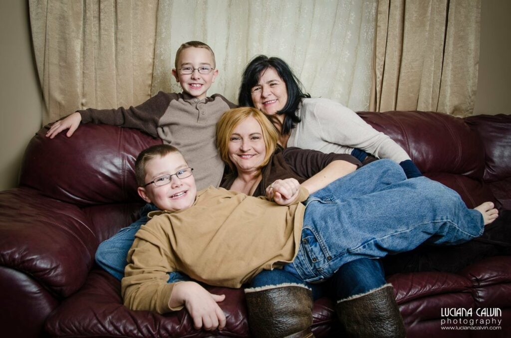 Family together on a couch for family photo