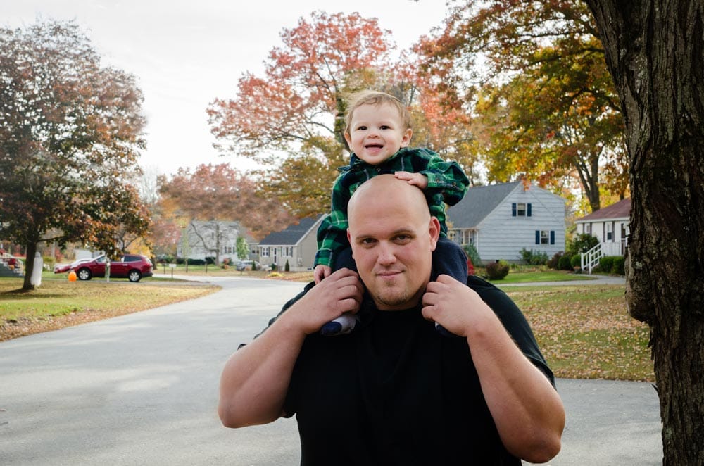 Baby boy on fathers shoulder