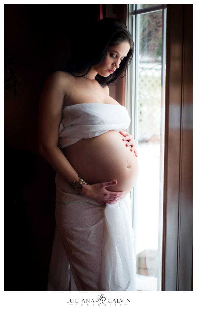 pregnant mother on the window