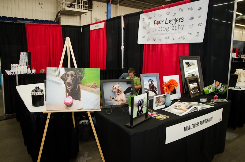 Pet expo table with albums and products