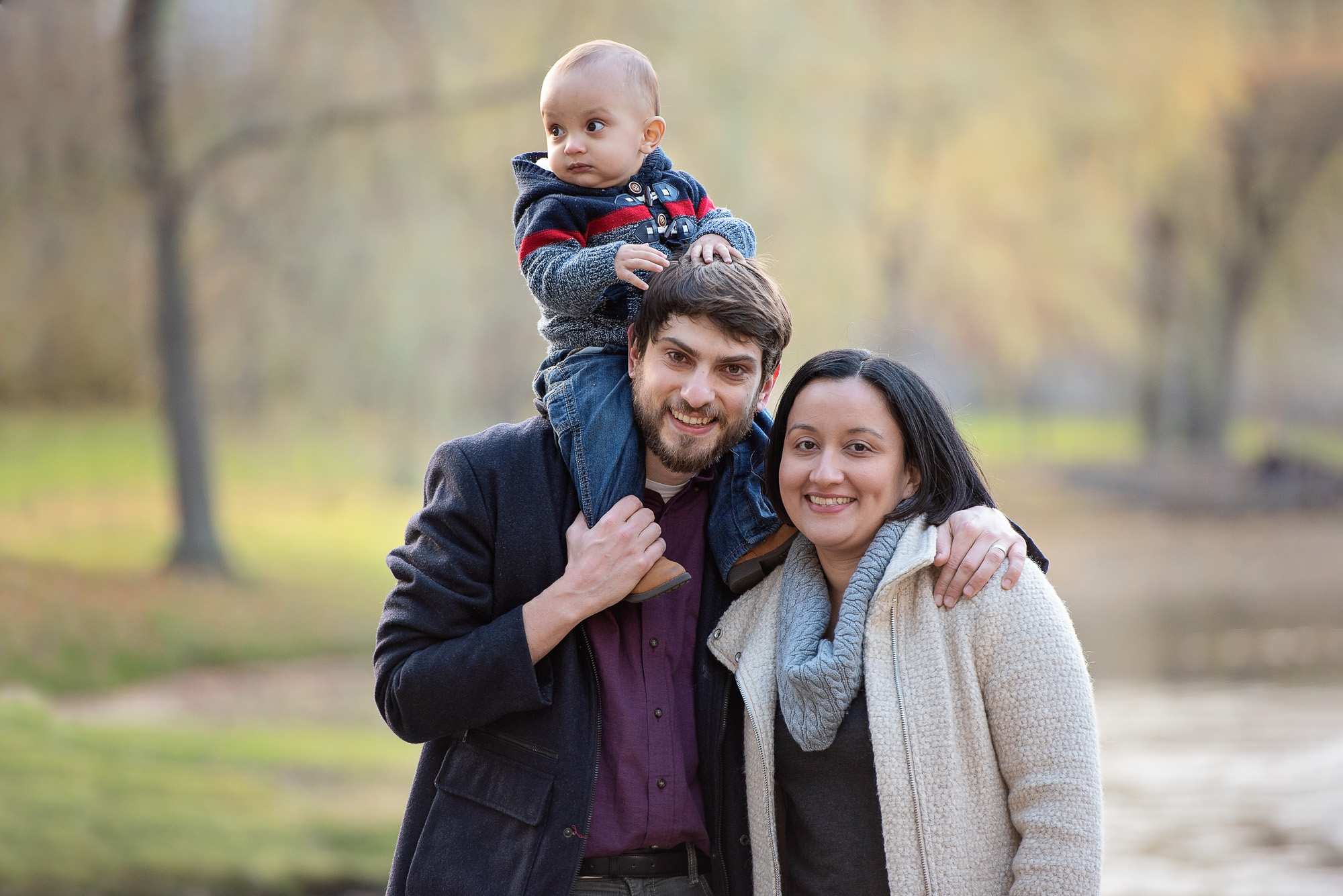 Family posing at sunset