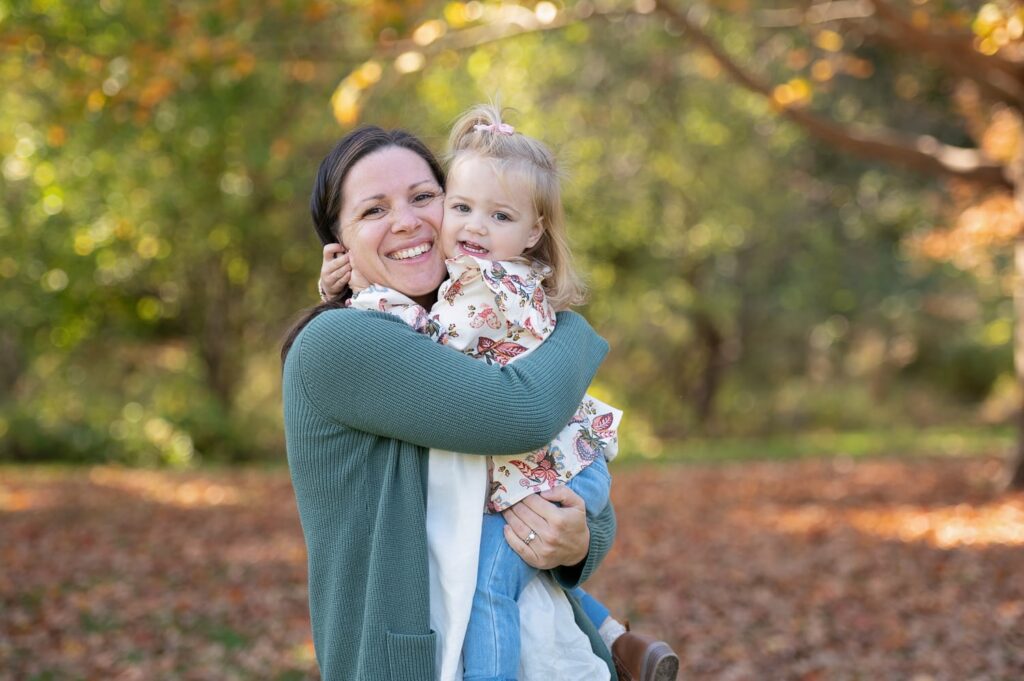 a woman holding a child