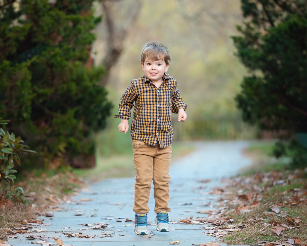 a boy walking on a path