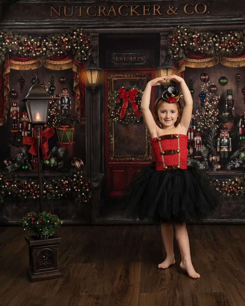 a girl in a tutu and a hat